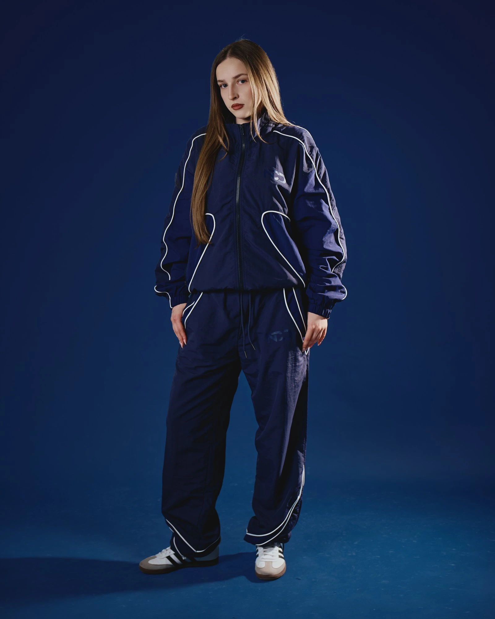 Female model — blue bg